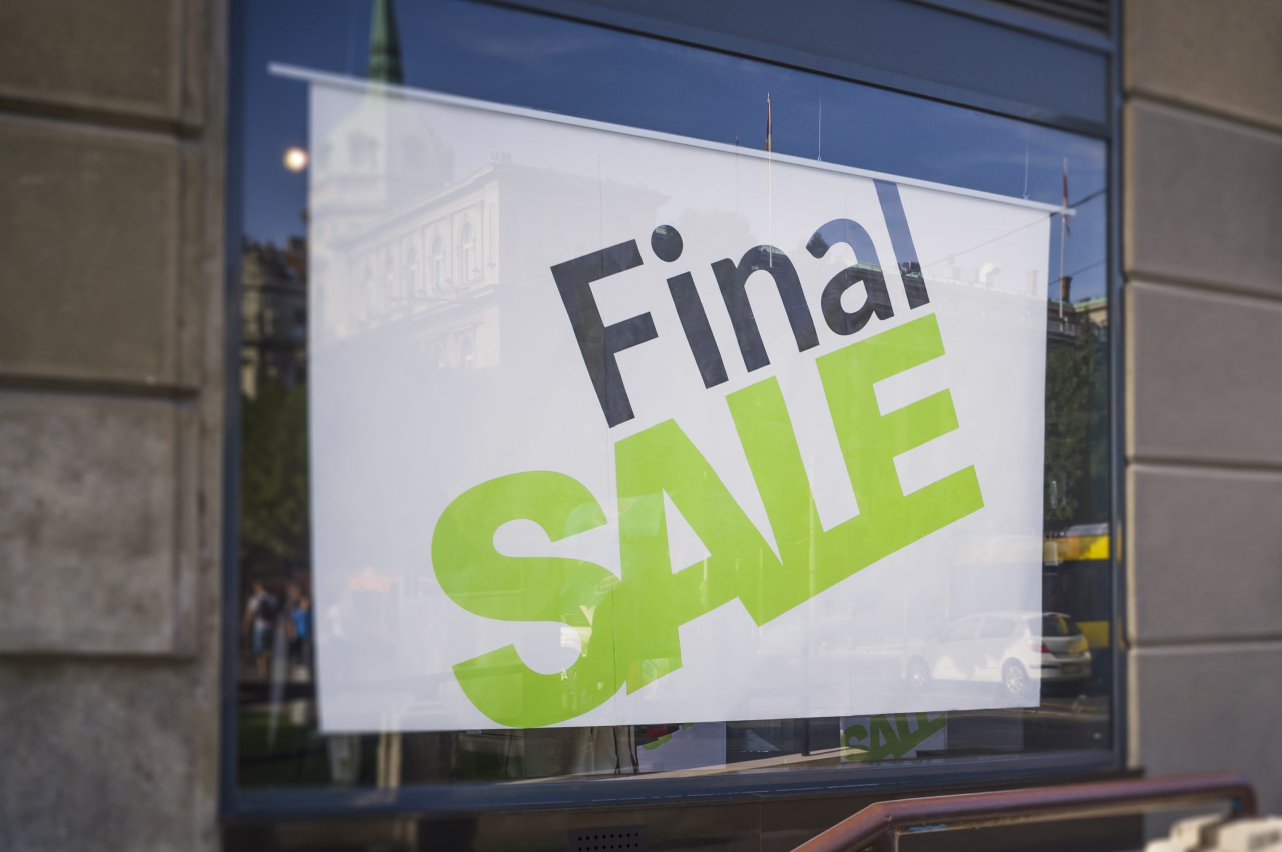 Retail Image Of A Final Sale Sign In A Clothing Store Window (With Shallow DoF)